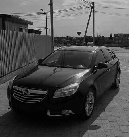 Чорний Опель Інсігнія, об'ємом двигуна 1.96 л та пробігом 256 тис. км за 8175 $, фото 1 на Automoto.ua