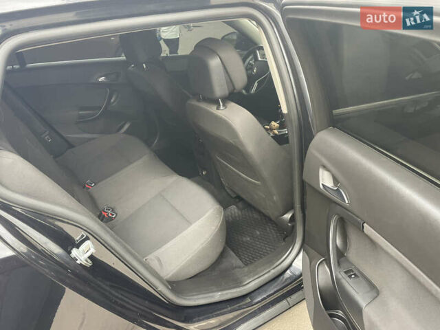 Черный Опель Инсигния, объемом двигателя 1.96 л и пробегом 302 тыс. км за 7700 $, фото 6 на Automoto.ua