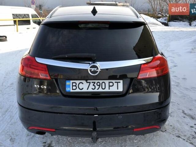 Чорний Опель Інсігнія, об'ємом двигуна 1.96 л та пробігом 298 тис. км за 5800 $, фото 9 на Automoto.ua