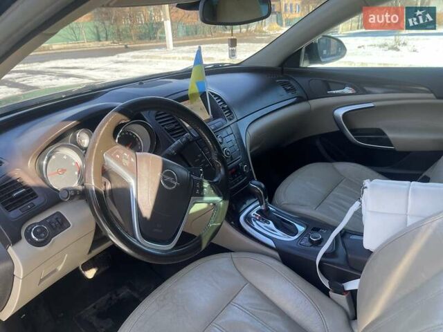 Чорний Опель Інсігнія, об'ємом двигуна 2 л та пробігом 277 тис. км за 9300 $, фото 7 на Automoto.ua