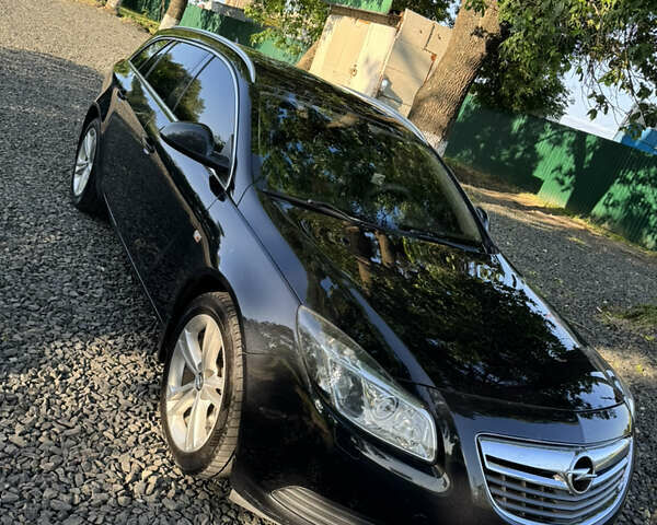 Черный Опель Инсигния, объемом двигателя 1.96 л и пробегом 301 тыс. км за 7600 $, фото 4 на Automoto.ua