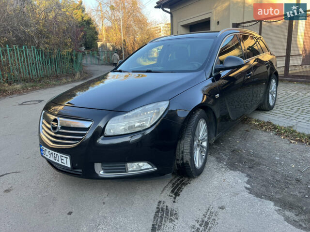 Чорний Опель Інсігнія, об'ємом двигуна 2 л та пробігом 261 тис. км за 8500 $, фото 3 на Automoto.ua