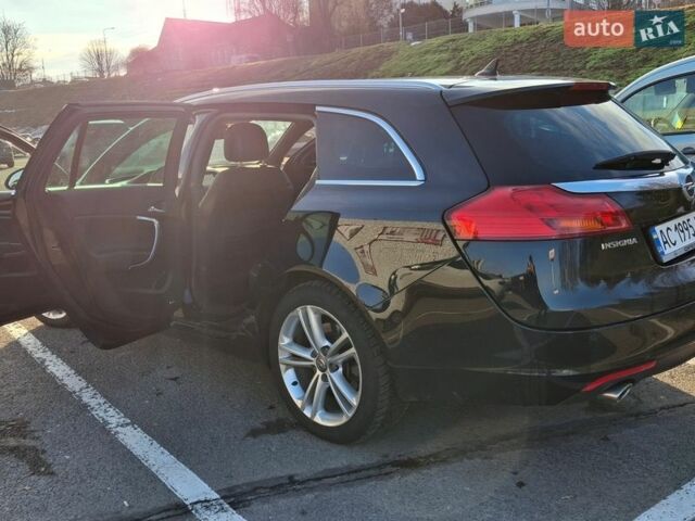 Черный Опель Инсигния, объемом двигателя 1.96 л и пробегом 180 тыс. км за 9900 $, фото 4 на Automoto.ua