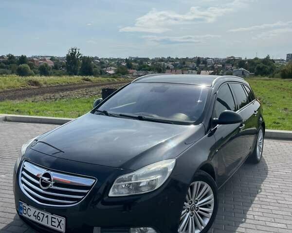 Чорний Опель Інсігнія, об'ємом двигуна 1.96 л та пробігом 256 тис. км за 8175 $, фото 2 на Automoto.ua