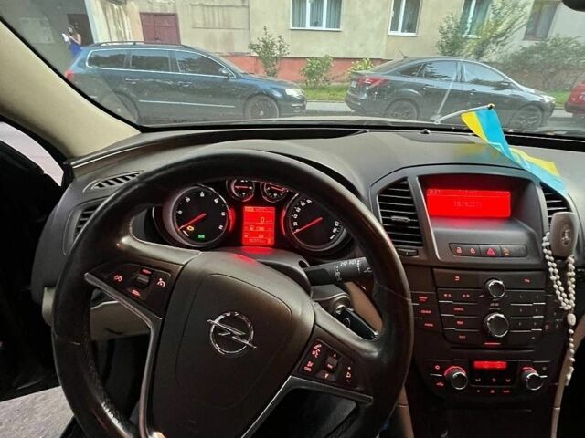 Чорний Опель Інсігнія, об'ємом двигуна 1.96 л та пробігом 268 тис. км за 7200 $, фото 5 на Automoto.ua