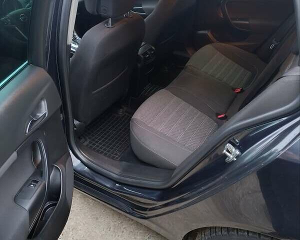 Чорний Опель Інсігнія, об'ємом двигуна 1.96 л та пробігом 240 тис. км за 8888 $, фото 23 на Automoto.ua