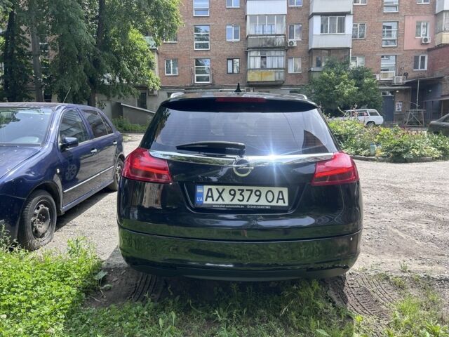 Чорний Опель Інсігнія, об'ємом двигуна 2 л та пробігом 243 тис. км за 7513 $, фото 2 на Automoto.ua