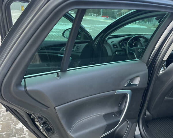 Черный Опель Инсигния, объемом двигателя 1.96 л и пробегом 244 тыс. км за 10300 $, фото 12 на Automoto.ua