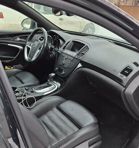 Чорний Опель Інсігнія, об'ємом двигуна 1.96 л та пробігом 176 тис. км за 10950 $, фото 9 на Automoto.ua