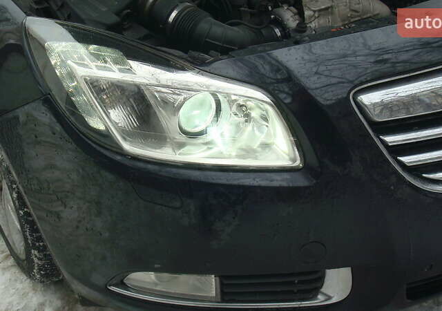 Чорний Опель Інсігнія, об'ємом двигуна 1.96 л та пробігом 247 тис. км за 9499 $, фото 6 на Automoto.ua