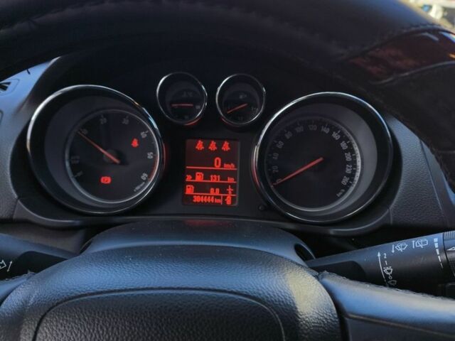 Черный Опель Инсигния, объемом двигателя 2 л и пробегом 304 тыс. км за 7700 $, фото 5 на Automoto.ua