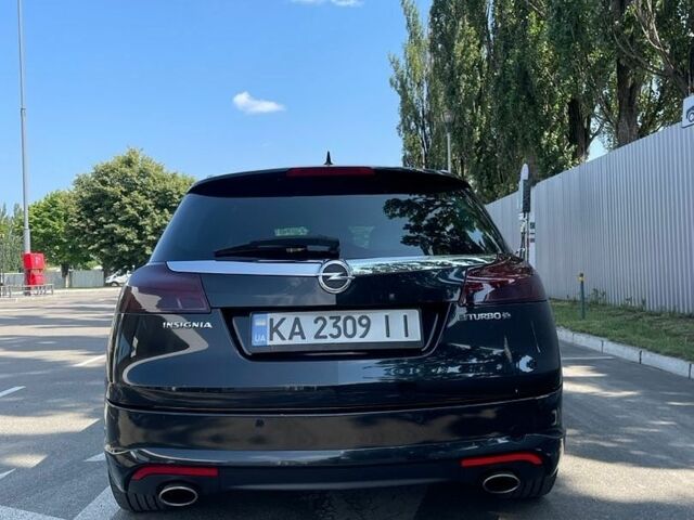 Чорний Опель Інсігнія, об'ємом двигуна 1.96 л та пробігом 208 тис. км за 12000 $, фото 5 на Automoto.ua