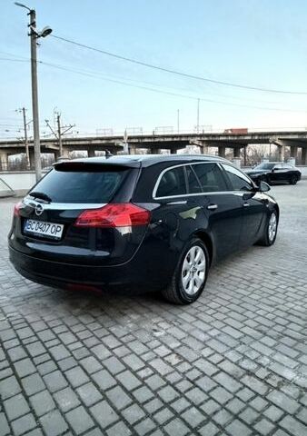Чорний Опель Інсігнія, об'ємом двигуна 1.96 л та пробігом 254 тис. км за 8900 $, фото 5 на Automoto.ua