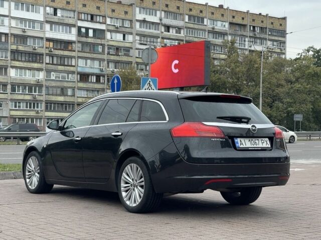 Черный Опель Инсигния, объемом двигателя 2 л и пробегом 309 тыс. км за 8800 $, фото 2 на Automoto.ua