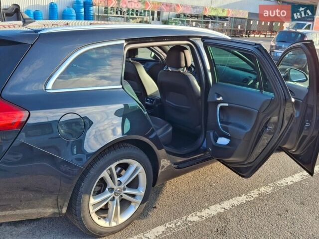 Черный Опель Инсигния, объемом двигателя 1.96 л и пробегом 180 тыс. км за 9900 $, фото 5 на Automoto.ua