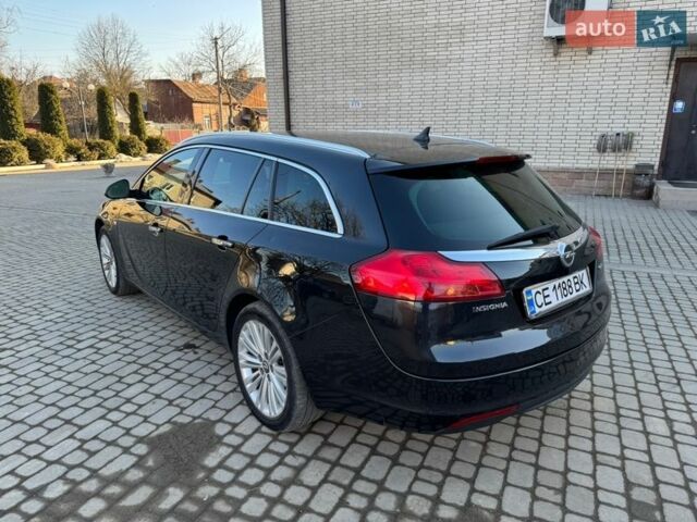 Чорний Опель Інсігнія, об'ємом двигуна 1.96 л та пробігом 209 тис. км за 7600 $, фото 6 на Automoto.ua