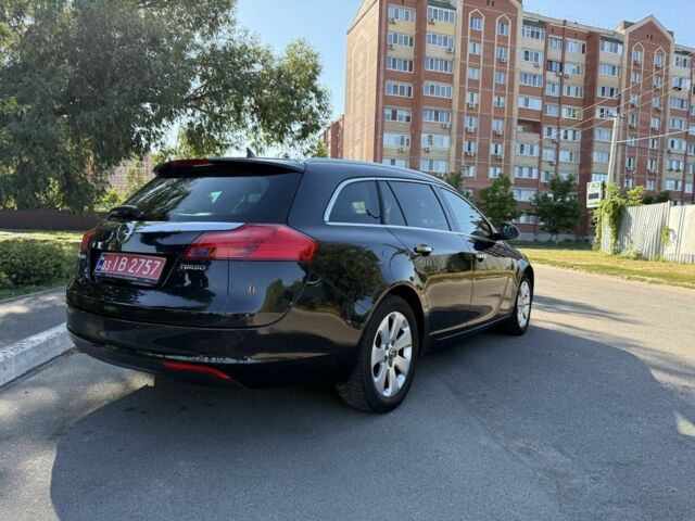 Чорний Опель Інсігнія, об'ємом двигуна 1.6 л та пробігом 191 тис. км за 9053 $, фото 5 на Automoto.ua