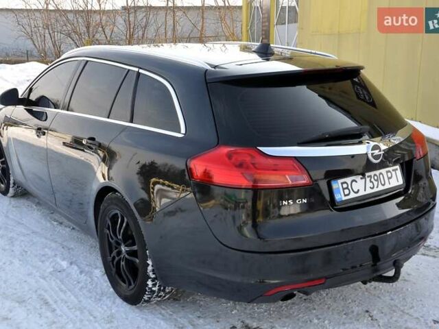 Чорний Опель Інсігнія, об'ємом двигуна 1.96 л та пробігом 298 тис. км за 5800 $, фото 11 на Automoto.ua