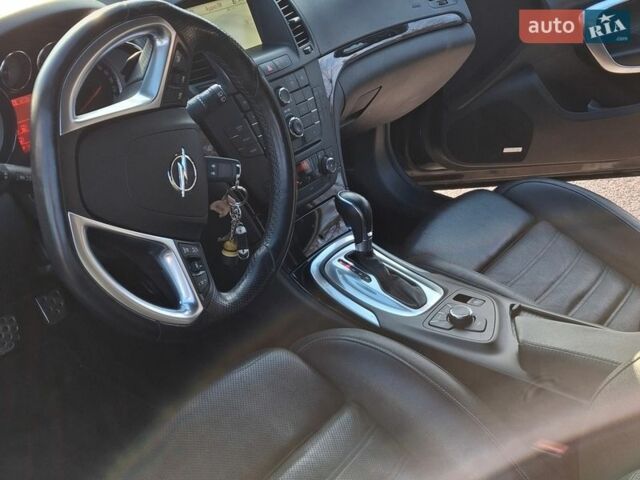 Черный Опель Инсигния, объемом двигателя 1.96 л и пробегом 180 тыс. км за 9900 $, фото 2 на Automoto.ua