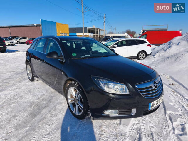 Чорний Опель Інсігнія, об'ємом двигуна 1.96 л та пробігом 210 тис. км за 8999 $, фото 7 на Automoto.ua