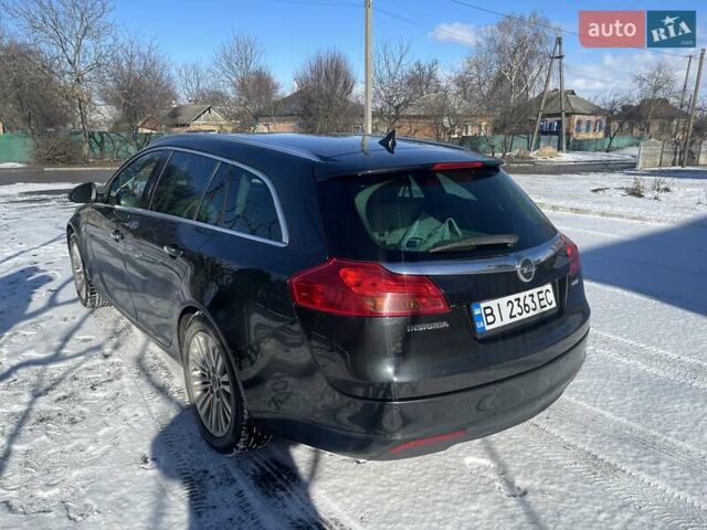 Чорний Опель Інсігнія, об'ємом двигуна 2 л та пробігом 277 тис. км за 9300 $, фото 10 на Automoto.ua