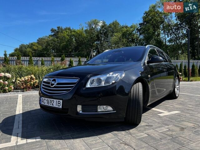 Черный Опель Инсигния, объемом двигателя 2 л и пробегом 232 тыс. км за 8900 $, фото 1 на Automoto.ua