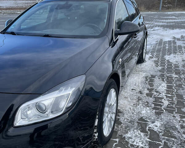 Черный Опель Инсигния, объемом двигателя 1.96 л и пробегом 244 тыс. км за 10300 $, фото 1 на Automoto.ua