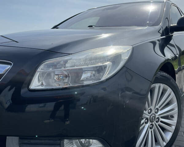 Чорний Опель Інсігнія, об'ємом двигуна 1.96 л та пробігом 256 тис. км за 8175 $, фото 4 на Automoto.ua