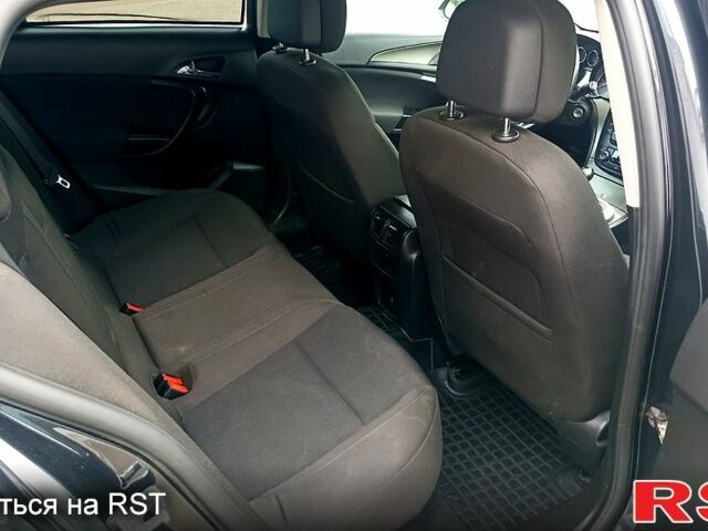 Чорний Опель Інсігнія, об'ємом двигуна 1.4 л та пробігом 192 тис. км за 6000 $, фото 5 на Automoto.ua