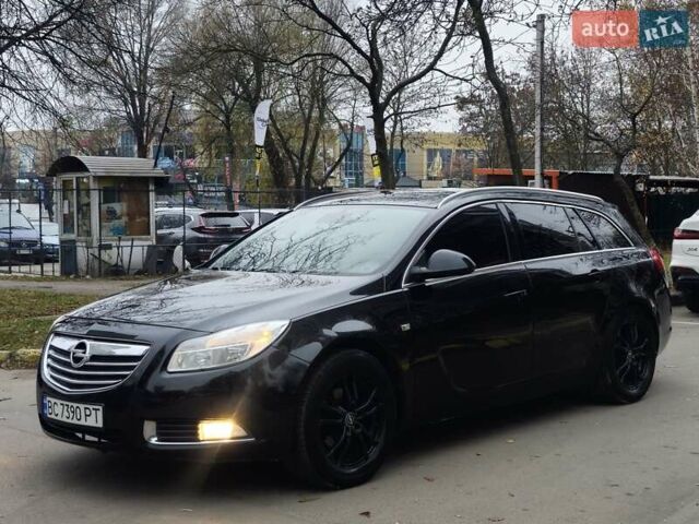 Чорний Опель Інсігнія, об'ємом двигуна 2 л та пробігом 292 тис. км за 5650 $, фото 7 на Automoto.ua