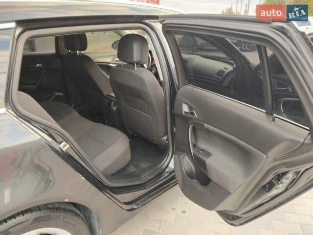 Черный Опель Инсигния, объемом двигателя 1.4 л и пробегом 344 тыс. км за 6800 $, фото 5 на Automoto.ua