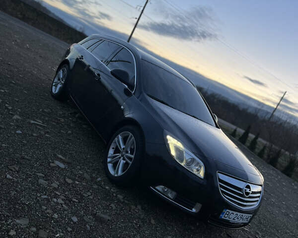 Чорний Опель Інсігнія, об'ємом двигуна 1.96 л та пробігом 255 тис. км за 7000 $, фото 4 на Automoto.ua