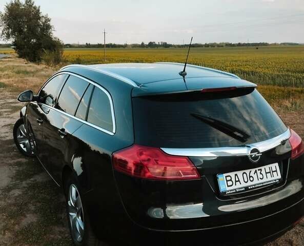 Черный Опель Инсигния, объемом двигателя 1.96 л и пробегом 293 тыс. км за 8100 $, фото 5 на Automoto.ua