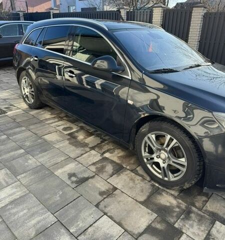 Чорний Опель Інсігнія, об'ємом двигуна 1.96 л та пробігом 260 тис. км за 8500 $, фото 1 на Automoto.ua