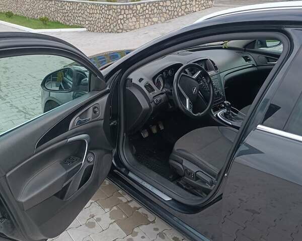 Чорний Опель Інсігнія, об'ємом двигуна 1.96 л та пробігом 300 тис. км за 7700 $, фото 4 на Automoto.ua