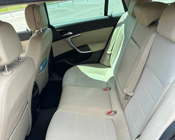 Черный Опель Инсигния, объемом двигателя 1.96 л и пробегом 290 тыс. км за 7999 $, фото 16 на Automoto.ua