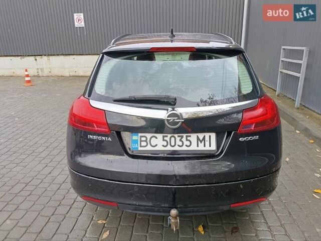 Черный Опель Инсигния, объемом двигателя 1.96 л и пробегом 317 тыс. км за 6200 $, фото 2 на Automoto.ua