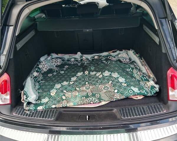 Чорний Опель Інсігнія, об'ємом двигуна 2 л та пробігом 194 тис. км за 12100 $, фото 18 на Automoto.ua