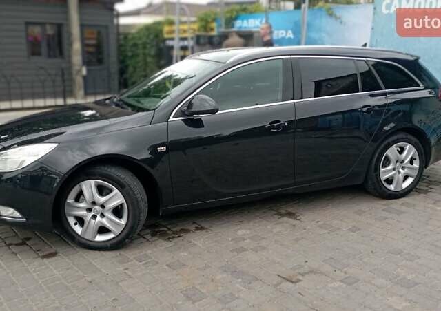 Чорний Опель Інсігнія, об'ємом двигуна 1.96 л та пробігом 234 тис. км за 8800 $, фото 4 на Automoto.ua