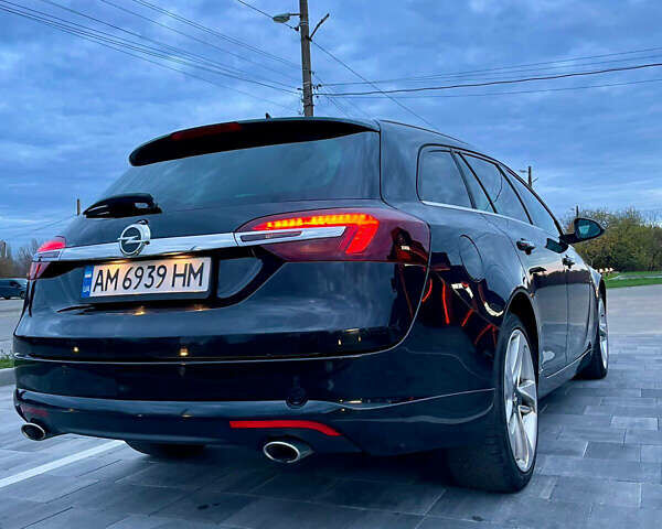 Черный Опель Инсигния, объемом двигателя 2 л и пробегом 243 тыс. км за 12500 $, фото 6 на Automoto.ua