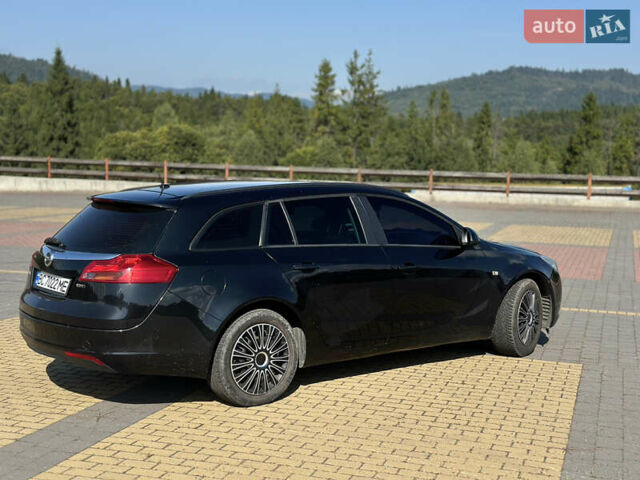 Черный Опель Инсигния, объемом двигателя 2 л и пробегом 299 тыс. км за 7799 $, фото 3 на Automoto.ua