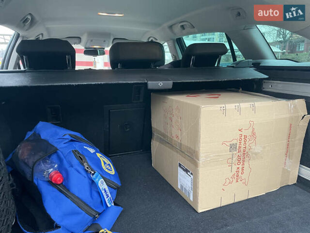 Черный Опель Инсигния, объемом двигателя 2 л и пробегом 180 тыс. км за 9400 $, фото 91 на Automoto.ua