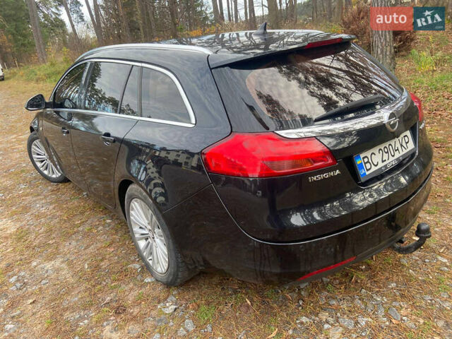 Черный Опель Инсигния, объемом двигателя 2 л и пробегом 270 тыс. км за 8800 $, фото 7 на Automoto.ua
