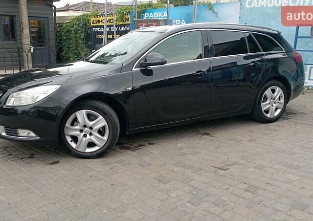 Чорний Опель Інсігнія, об'ємом двигуна 1.96 л та пробігом 234 тис. км за 8800 $, фото 8 на Automoto.ua