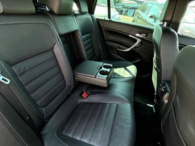 Черный Опель Инсигния, объемом двигателя 2 л и пробегом 211 тыс. км за 10400 $, фото 6 на Automoto.ua