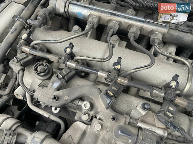 Черный Опель Инсигния, объемом двигателя 2 л и пробегом 180 тыс. км за 9400 $, фото 140 на Automoto.ua