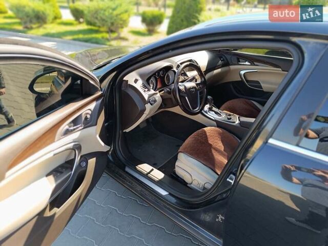 Чорний Опель Інсігнія, об'ємом двигуна 1.96 л та пробігом 295 тис. км за 7800 $, фото 6 на Automoto.ua