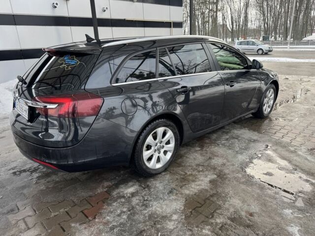 Чорний Опель Інсігнія, об'ємом двигуна 2 л та пробігом 236 тис. км за 10999 $, фото 3 на Automoto.ua