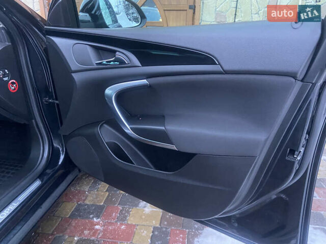 Чорний Опель Інсігнія, об'ємом двигуна 2 л та пробігом 182 тис. км за 9700 $, фото 27 на Automoto.ua