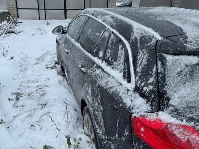 Черный Опель Инсигния, объемом двигателя 2 л и пробегом 270 тыс. км за 3498 $, фото 4 на Automoto.ua